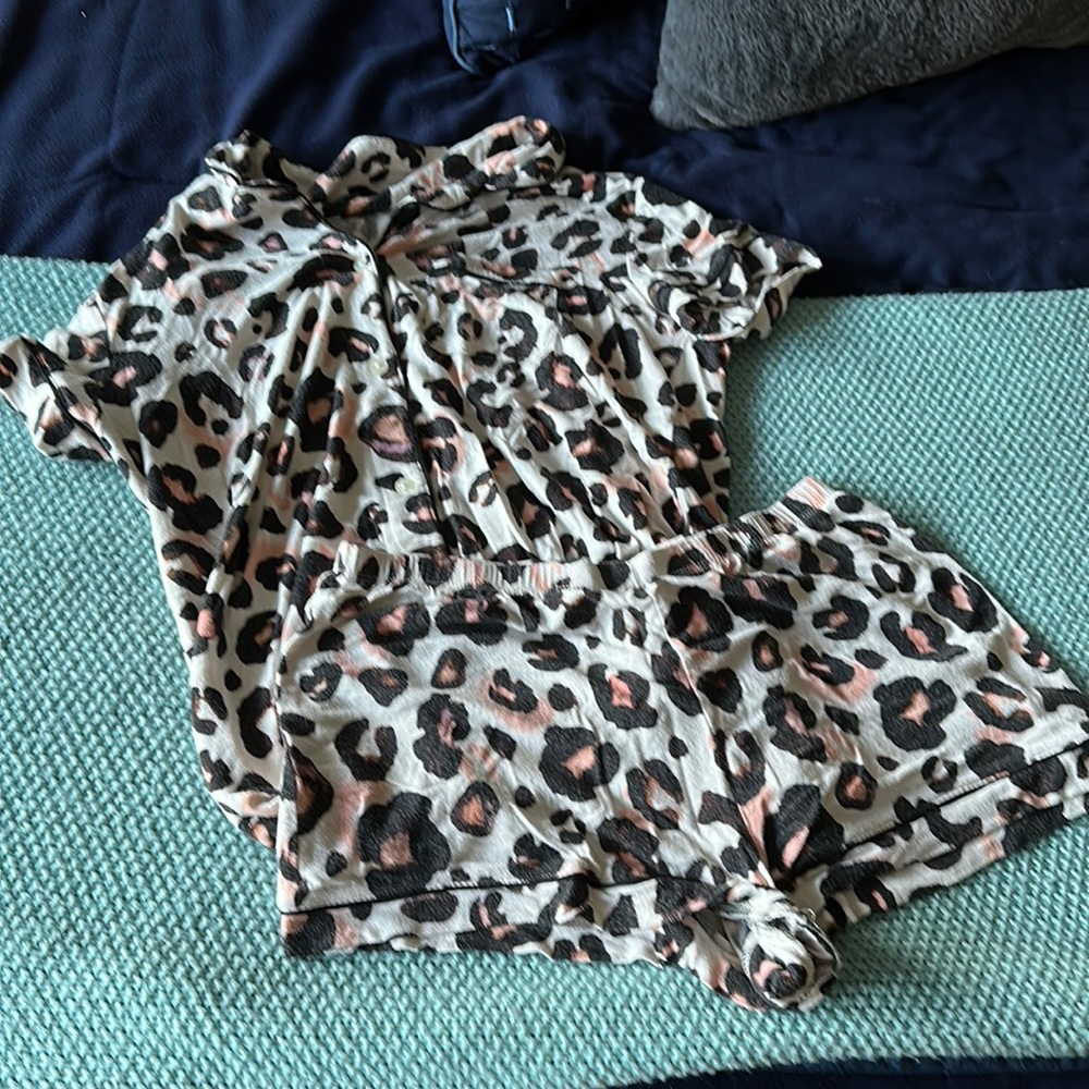 Target (stars above) cheetah print pajama set. Size XS. So soft and comfy